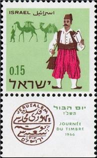https://i.colnect.net/b/2593/706/Turkish-postman-and-caravan.jpg